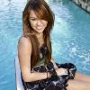 8zE68T264147-01 - multe poze miley