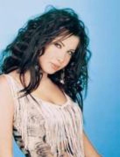 CLZCXQNSBGADQMPUECV - Nancy Ajram