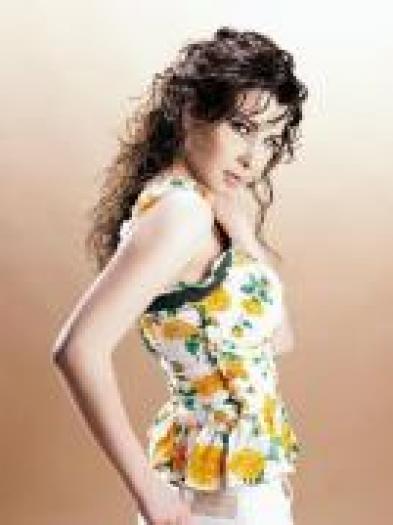 QBRHBOTUWNAWRIEOUKD - Nancy Ajram
