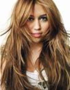 Miley are o frizura noua - Miley Cyrus