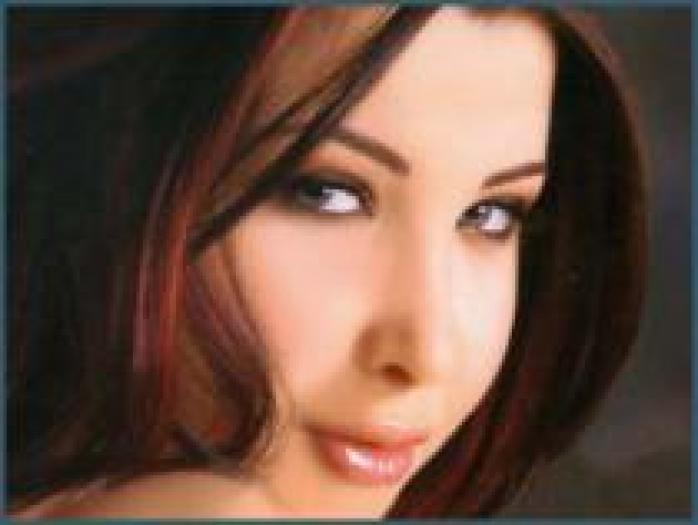 BWQVVXNWIUXLWEEWTOQ - Nancy Ajram