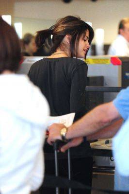 normal_09[1] - Selena Gomez Departing Lax Airport