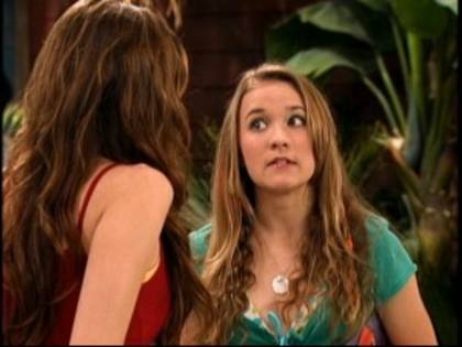 emily_osment_not_too_happy_with_what_Miley_Cyrus_is_telling_her