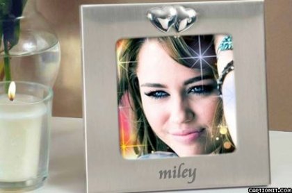 captionit9112007300D38 - miley0poze modificate de mine