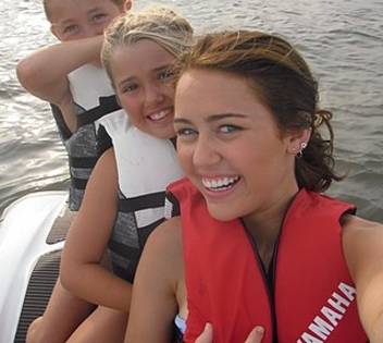 miley-cyrus-jetski.xlarge - Miley-Personal Picture