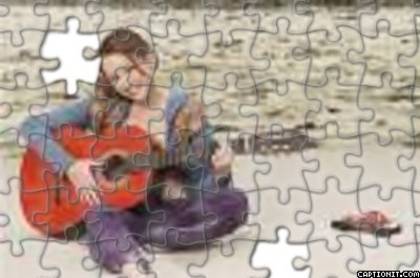 Miley canta la chitara - puzzle Hannah Montana