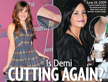 demi-lovato-cutting-again - poze demi lovato si jonas brothers