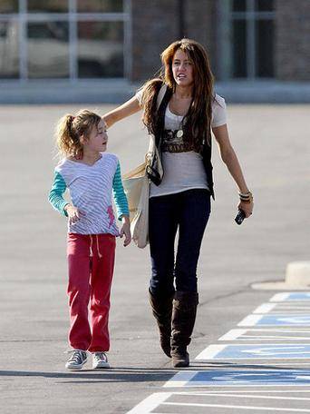 noah_cyrus_miley_cyrus_walking_car_park_342x456_160409_ - The Cyrus Sisters