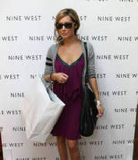 NDMEMVDQHZVOXFONIRX - ASHLEY TISDALE