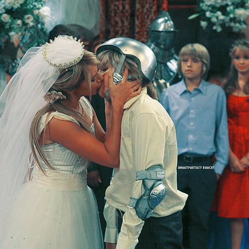 Maddie kissing Zack; Ashley Tisdale kissing Zack in "The Suite Life On Deck"
