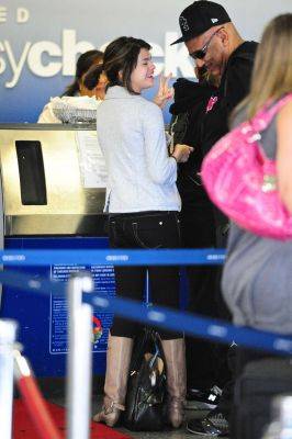 normal_08[1] - Selena Gomez Departing Lax Airport