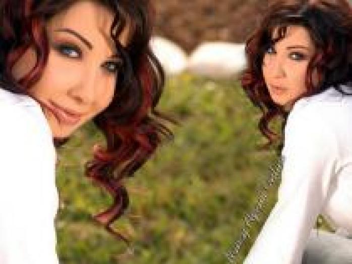 XHDAXBGCMLIHGGSKFPA - Nancy Ajram