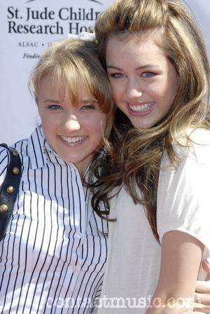 power_of_youth_25_wenn1609384 - Emily and Miley