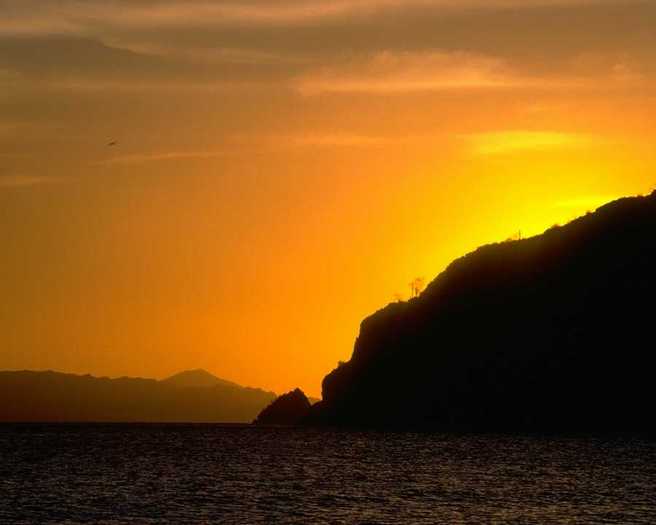 Sun Setting behind Mountain