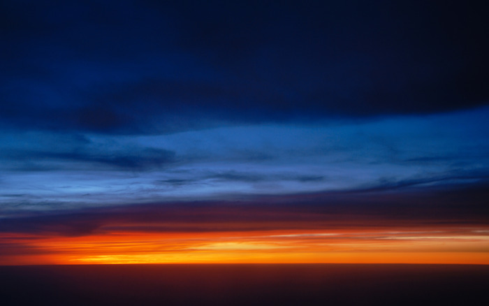 1920_sunsetovertheclouds_2560x1600