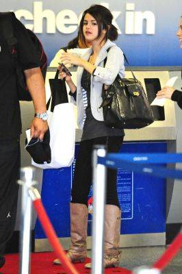 normal_01[1] - Selena Gomez Departing Lax Airport