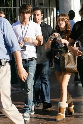 77723_model-justin-gaston-and-miley-cyrus-step-out-in-la-sept-2008