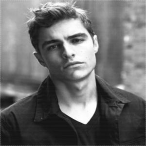 ✧.; — Se dă într-o parte când îi varsă doza pentru a nu-i murdări pantalonii, apoi ridică; din umeri şi apucă de capetele tricoului, trăgându-şi-l peste cap şi aruncându-l peste ea apoi. Ai fost inspirată, ce pot spune, chiar mi-era cald.. # Scutură uşor din cap şi-şi trece degajat palmele 
