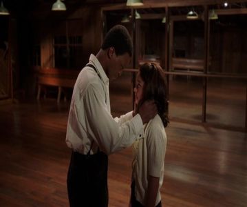 — Mă ridic și îmi netezesc rochița de pe mine pentru a nu ieși afară cu ea boțită. Privirea; mi se mută pe Mike și aștept să iasă și el doar pentru a nu ieși prima din casă. Găsesc o oglindă în jur și îmi aranjez funda cu care imi prinsesem părul.
