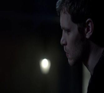 — „Pune-mi și mie.” Îl vede pe Elijah „Ce mergi așa înțepat? Ți-a rămas vreun borcan înfipt; în cwr?” Când vede că Elena îl ia pe Felix, se folosește de viteza de vampir și îi fură copilul din brațe, agățându-l cu pampersul de lustră. „Data viitoare nu-l mai lăsa se ne urle nouă în cap.”
