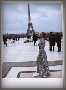 ˓0̣5̣ᵗʰ Ɲ̞.˒ Ester Expósito awaiting her foretold kindred spirit in front of la tour Eiffel.