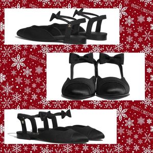 Bella received a pair of black Chanel satin Mary Jeans shoes from Candy.