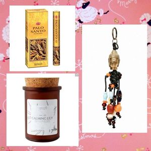 Meti received a pack of Palo Santo burning sticks, a Calming Lily Cannabis Coconut candle and; a Boho Buddha keychian from Candy.
