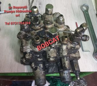 Distribuitor bobcat , reparatii