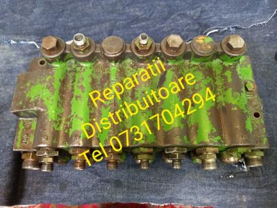 REPARATII DISTRIBUITOARE JOHN DEERE