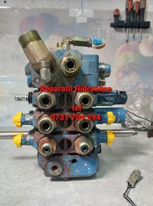 Reparatii Distribuitoare Komatsu