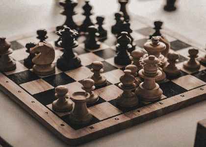 I needed to take 10 after this too.; Footage of Capucine and Tate playing chess.
