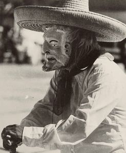 vigoroso campesino michoacano representando a un ັ Viejito ົ Cherapán —— 1962