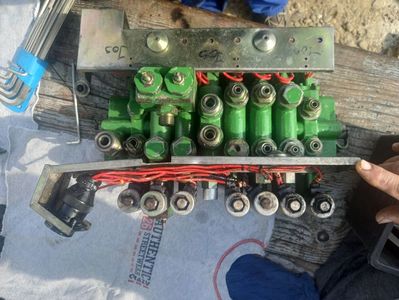 Reparatii Distribuitoare John Deere