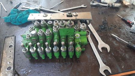 Reparatii Distribuitoare JOHN DEERE