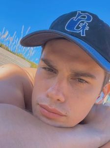 cap: on. swimming trunks: off.