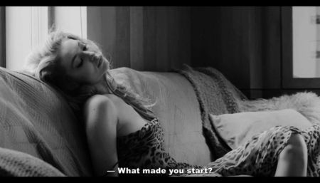 Something flickers in her stomach, but she pushes past it, shifting slightly, the blanket; pooling around her lap.
