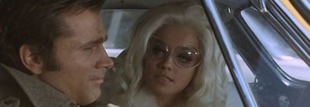 Romolo Guerrieriʼs 1969 U͟n͟ d͟e͟t͟e͟c͟t͟i͟v͟e: It was all cigarette smoke and cold stares. I kept; watching Belli’s face, trying to guess what he really felt, but maybe that’s the point, men like him don’t say much. I think part of me liked not being told everything. It made me lean in closer.
