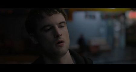 They circle each other like animals, every breath heavy, every glance a judgment. Evan; mutters, “We’re all poisoned already,” before plunging the syringe into his arm. The others follow.

