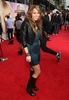 89693_miley-cyrus-wears-a-rock-n-roll-look-at-the-hannah-montana-the-movie-premiere-in-la