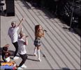 Ariana performing in front of a school in Japan - 2O14