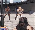 Ariana performing in front of a school in Japan - 2O14