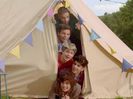 One-Direction-Live-While-Were-Young-music-video-tent-pile-400x300