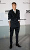 Justin-Bieber-rolls-sleeves-up-on-Dolce-Gabbana-suit