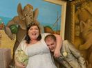 bride-has-groom-in-head-lock-608x455