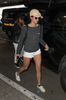 nina-dobrev-leggy-in-shorts-at-lax-airport-in-los-angeles-3-6-2017-10