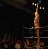 Kelly Kelly stands on the bottom rope