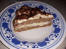 Tort cu cremă de vanilie și ciocolată albă (felie)