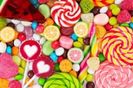 colorful-lollipops-different-colored-round-candy-top-view-85491170