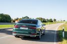 2020-audi-a8-hybrid-rear-view-driving-carbuzz-660035-1600