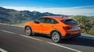 2020-audi-q3-sportback-rear-view-driving-carbuzz-610050-1600